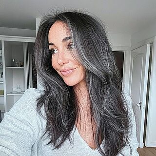 Customer wearing color 1B40 hair extensions
