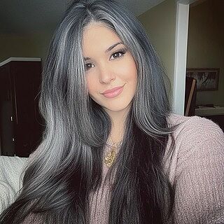 Customer wearing color 1B40 hair extensions