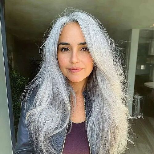 Customer wearing color #1B/80 hair extensions