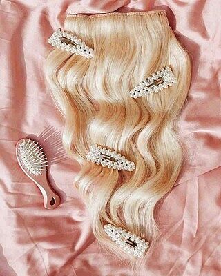Customer wearing bleach blonde #613 hair extensions
