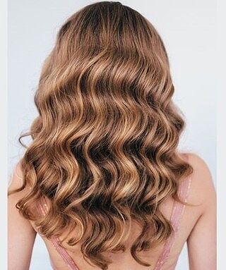 Customer wearing ombre balayage hair extensions
